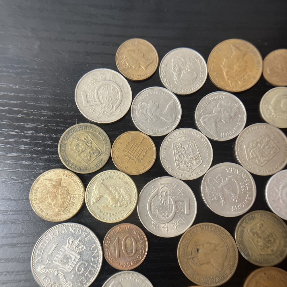 34 International Coins.