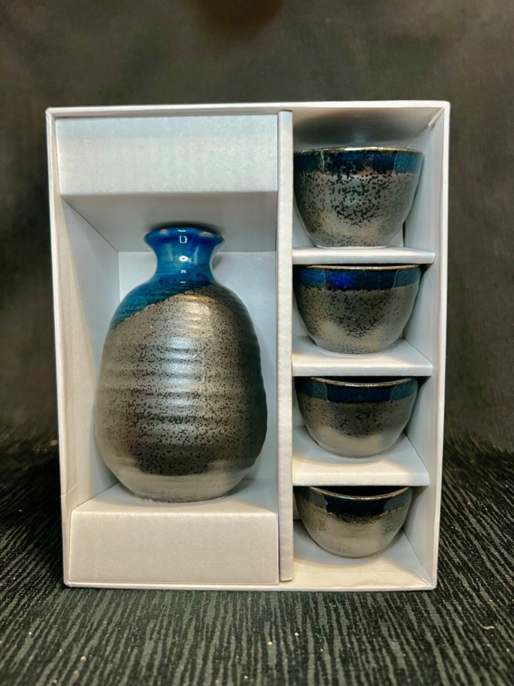 NIB JOYCE CHEN 5 PIECE SAKE SET.