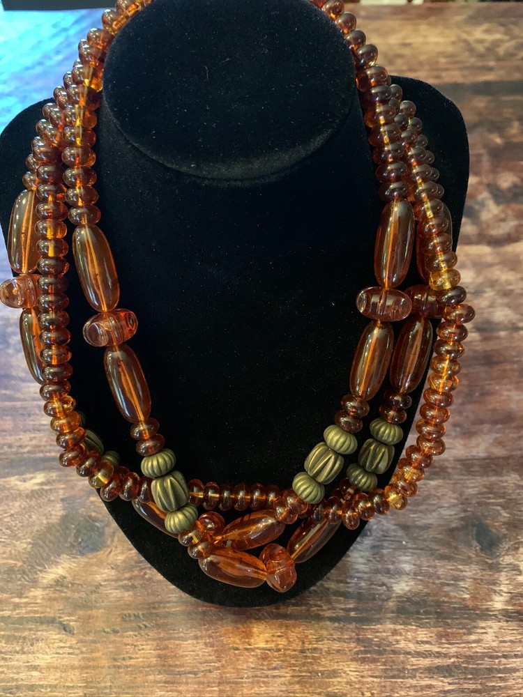 Vintage multi-stranded plastic beaded necklace. 18"