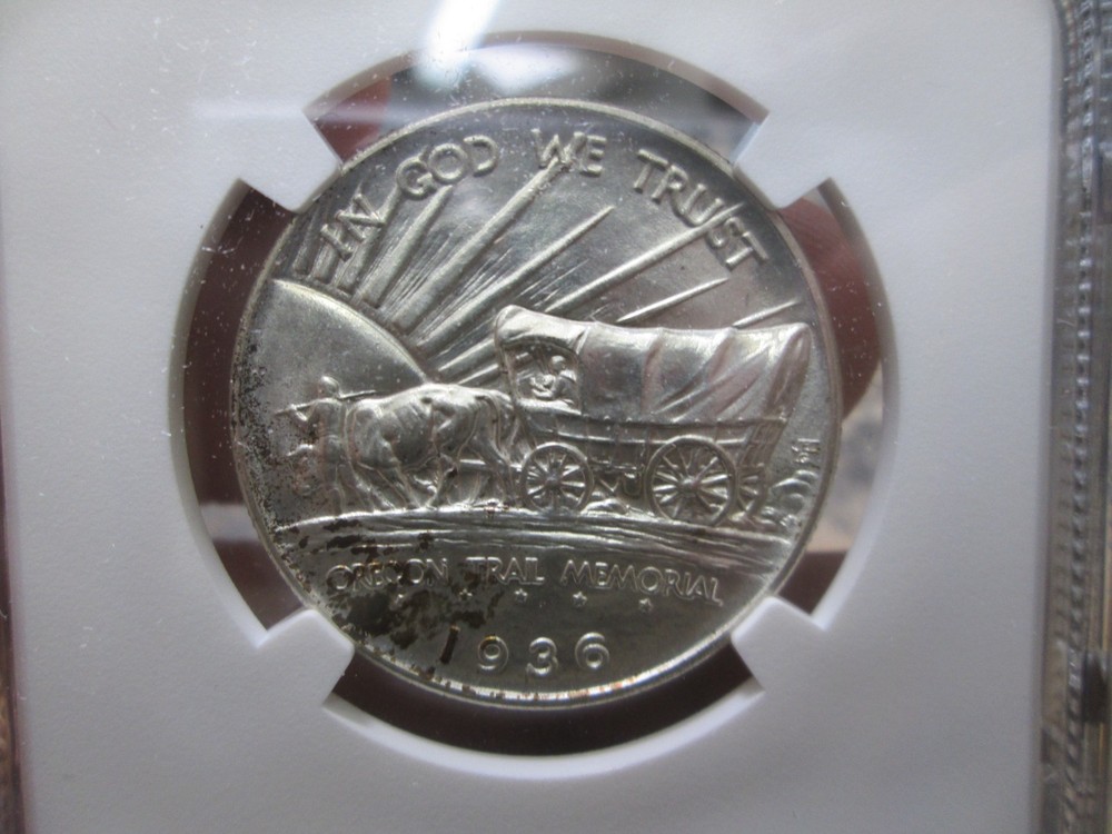 1936 OREGON TRAIL COMMORATIVE HALF DOLLAR IN NGC MS66 UNCIRCULATED CONDITION