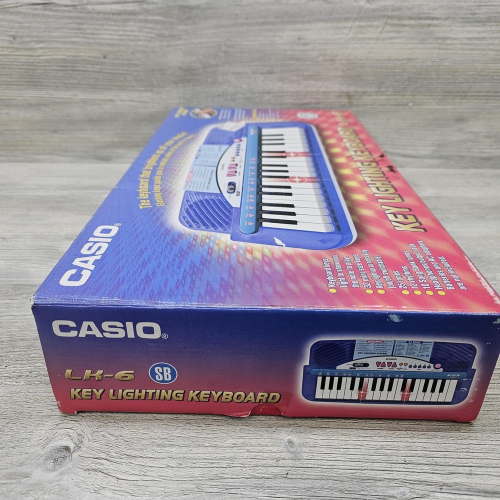 Casio LK-6 Key Lighting 32-Key Blue Learning Electronic Keyboard Battery Powered
