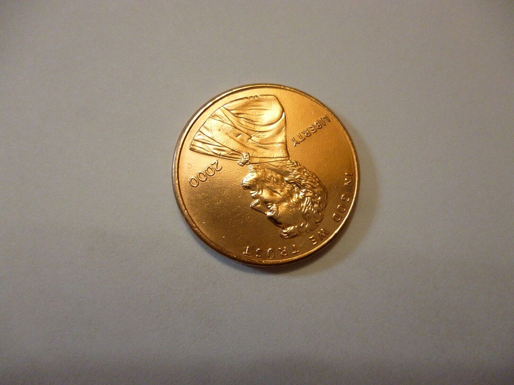 2000 penny, Floating roof coin