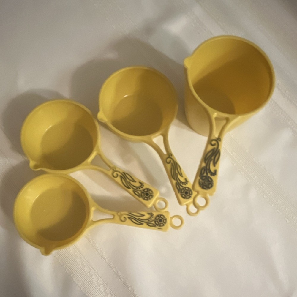 Yellow Plastic Measuring Cup Set Floral Handles Nesting Round 4 Piece