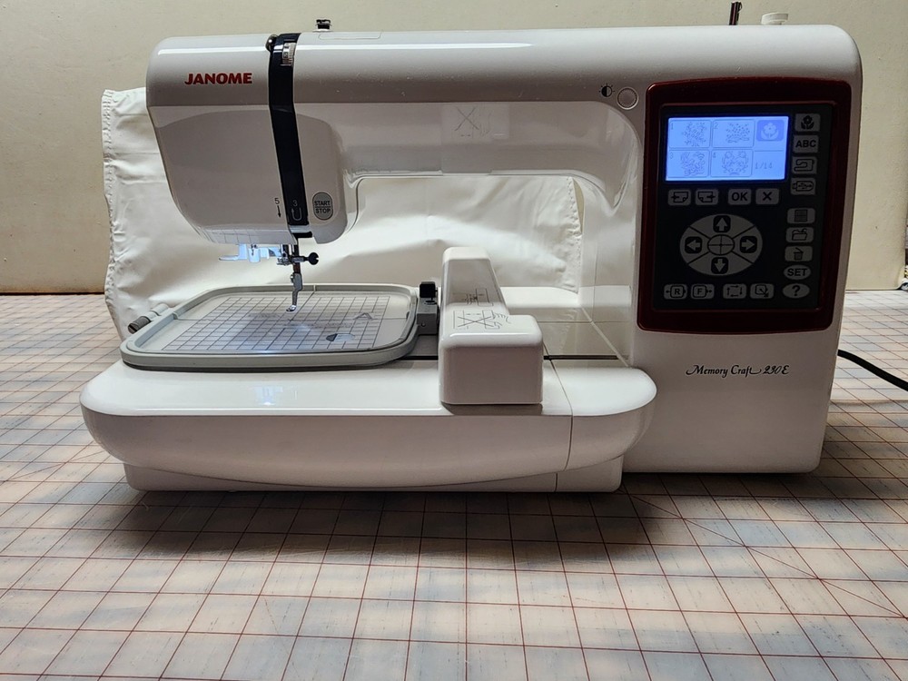 Janome Memory Craft 230E Computerized Sewing/Embroidery Combo, Portable