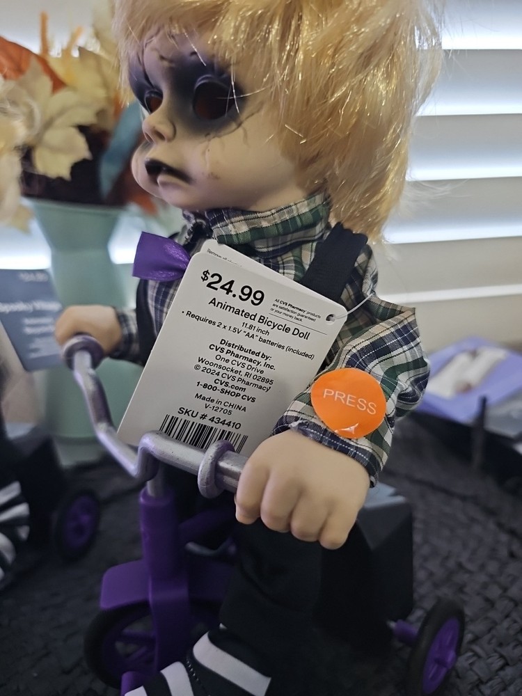 Animated Bicycle Doll