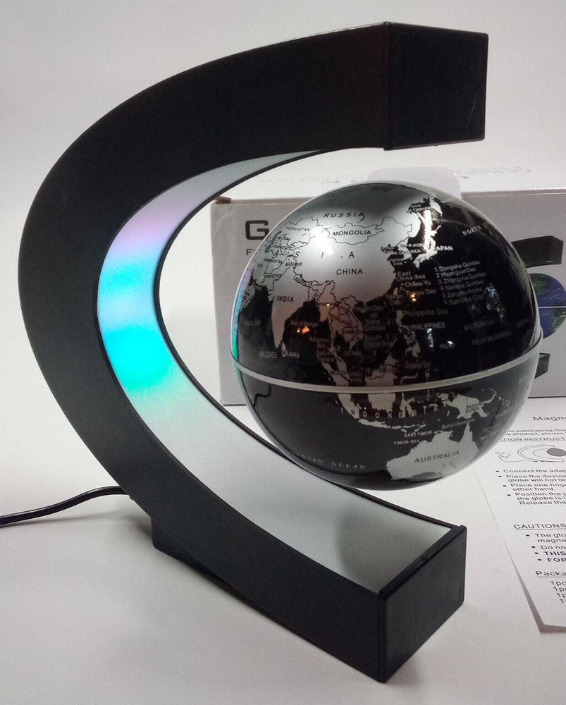 Globe Magnetically Floating in Midair Colorfully Lighted Black & Silver Globe