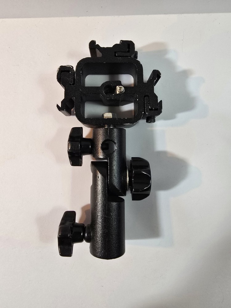Promaster Triple Shoe Flash Mount Adapter also holds Umbrella