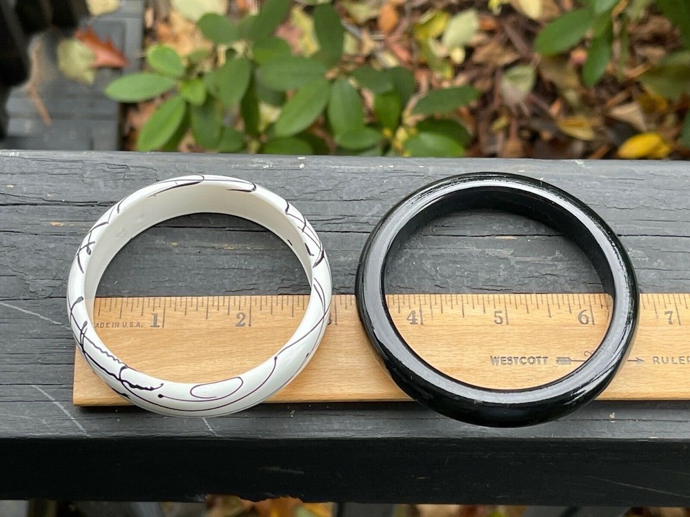 Two Early Plastic Molded Bangle Bracelets Black & White