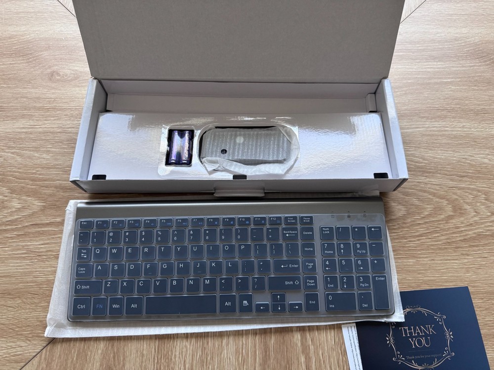 Wireless Ultra Thin Keyboard and Mouse Combo KM9000