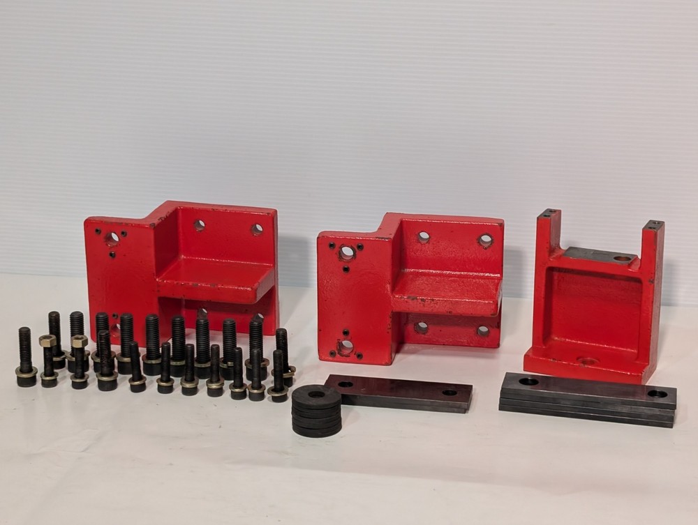 Red safety machinist assembly component blocks with parallels, spacers, as shown