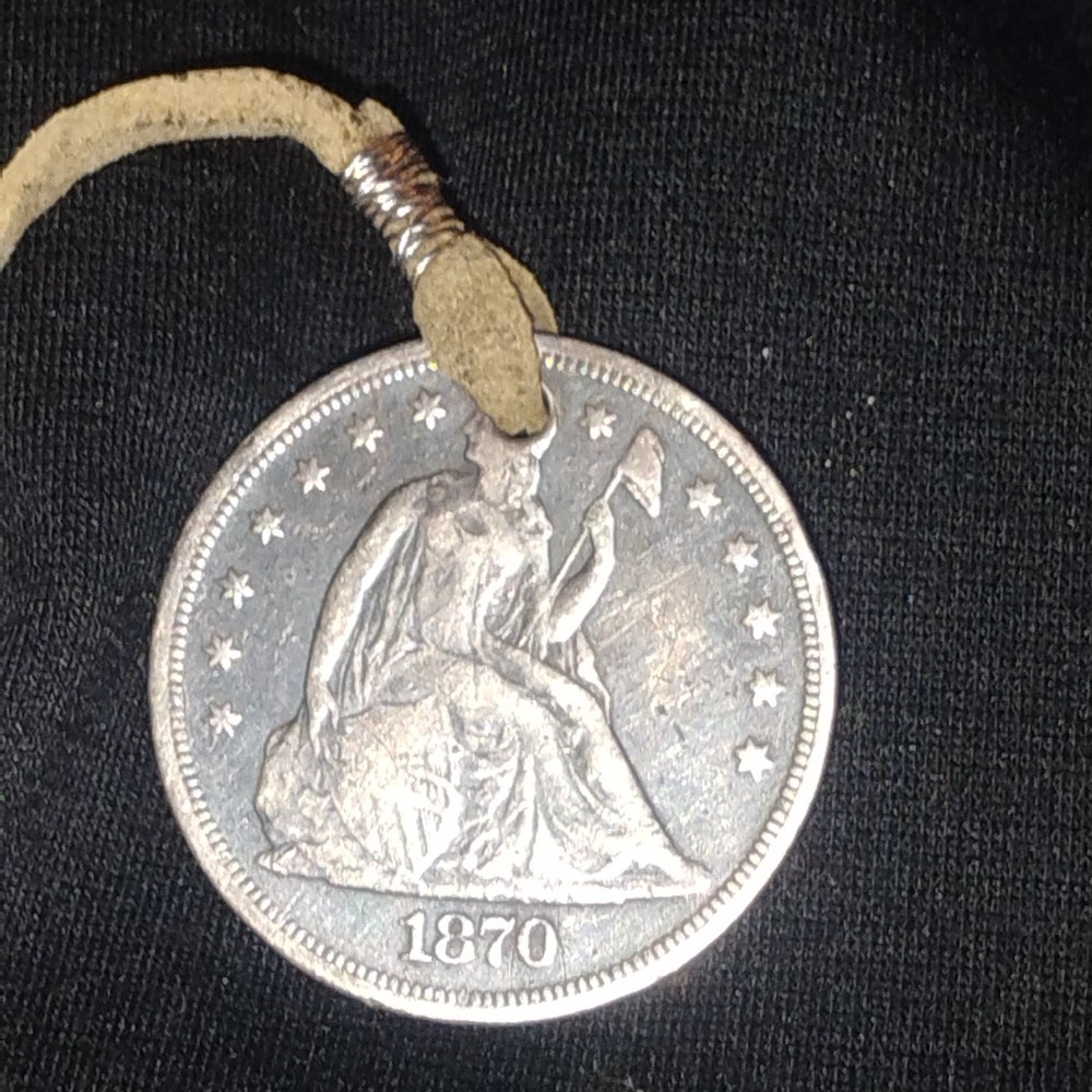 1870 Seated Liberty Dollar