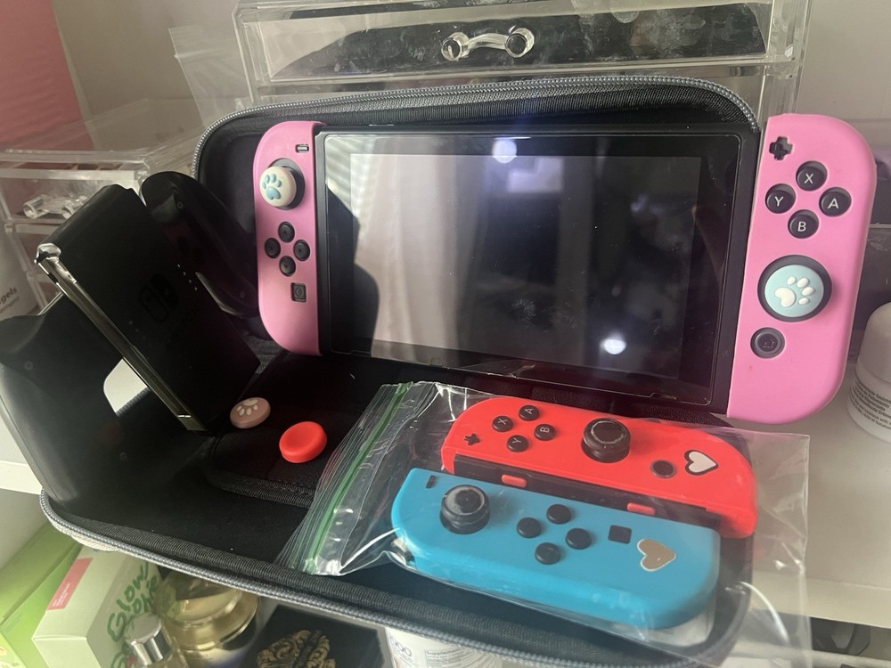 Nintendo Switch Console w/ Joy-Con, Grip, tomtoc Case, Thumb Grips