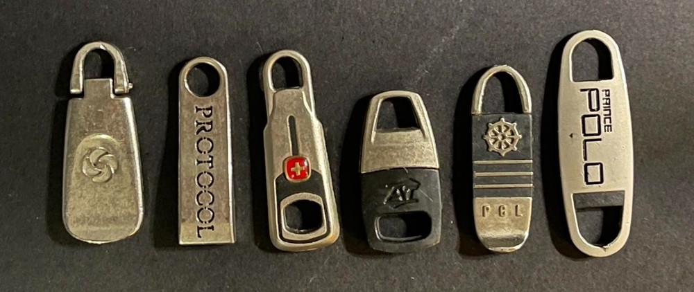 Lot of (6) Assorted Luggage Replacement Zipper Pulls.
