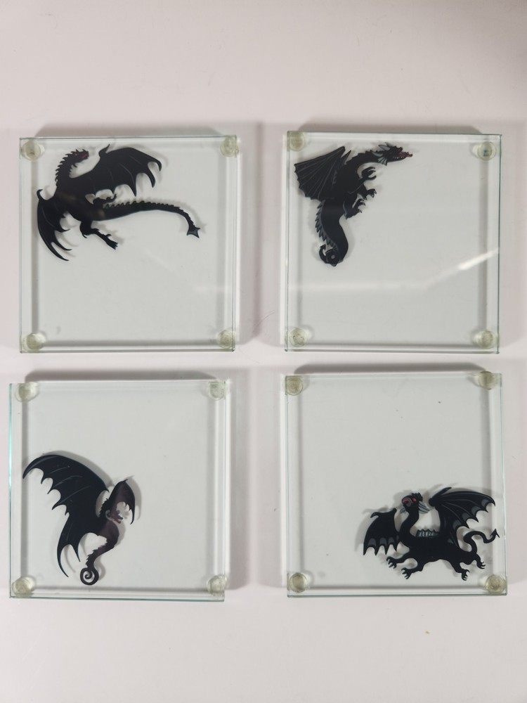 Glass Coasters With Dragon Silhouettes