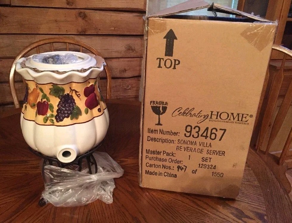 Celebrating Home Beverage Dispenser on Wrought Iron stand Sonoma Villa Stonewear