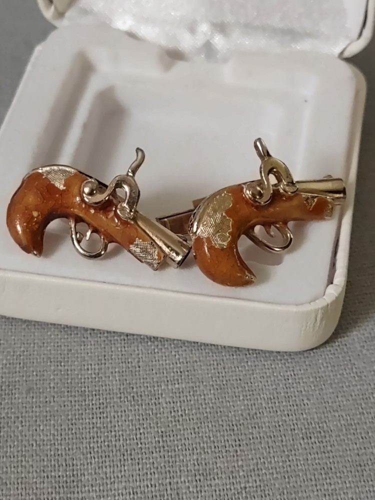 Derringer cufflinks by Swank