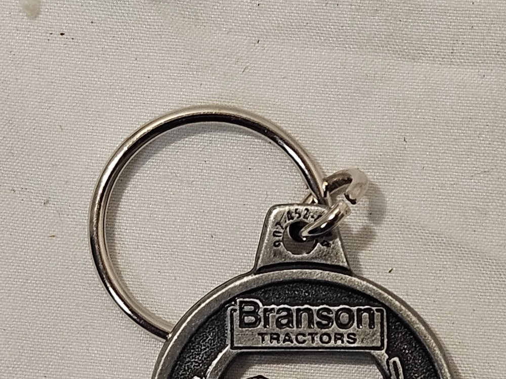 NEW BRANSON TRACTOR CO. 2 SIDED METAL KEYCHAIN FEATURING LOADER TRACTOR