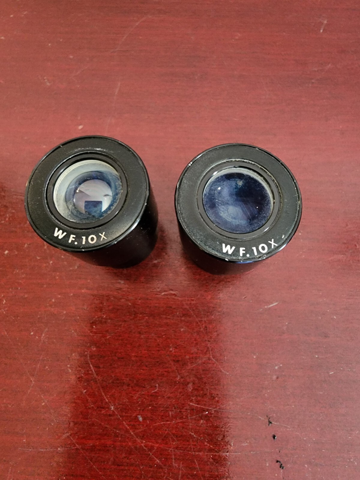 PAIR(2) OF WF.10X MICROSCOPE EYEPIECES. NO CRACKS OR CHIPS. WORKS