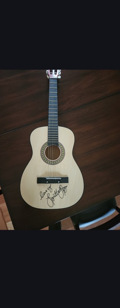 Guitar signed by Loretta Lynn