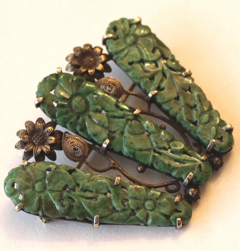 STERLING SILVER AND CARVED JADE PIN
