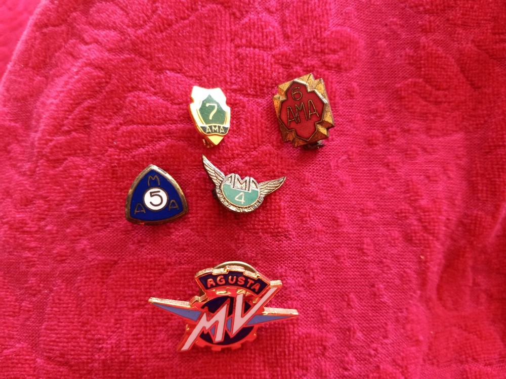 AMA motorcycle pins -one is MV Agusta