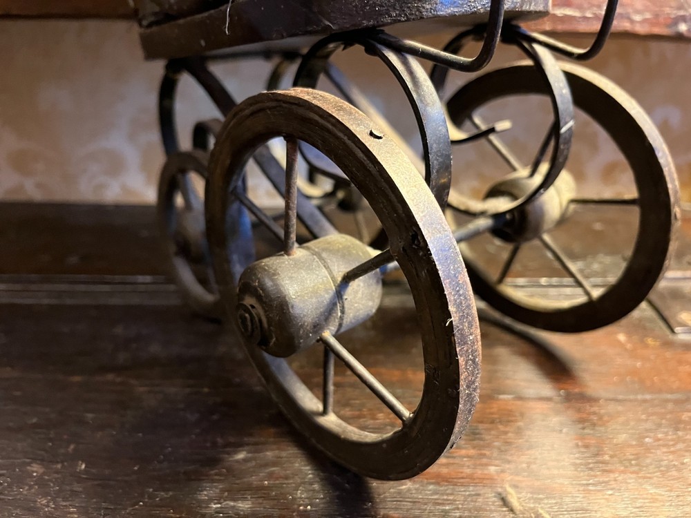 Vintage style toy pram.