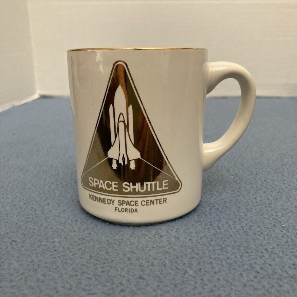 Kennedy Space Center Florida Space Shuttle on Gold Background Coffee Mug
