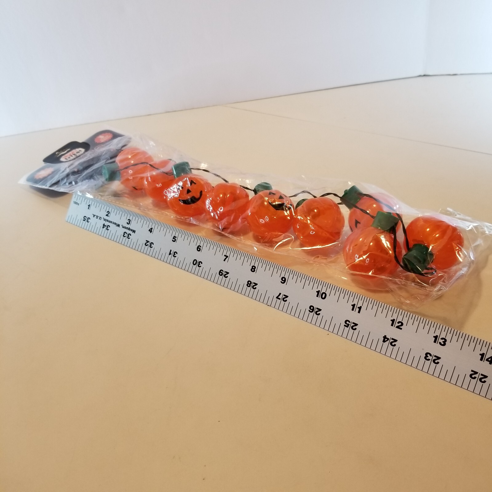 Light up Pumpkin Jack O Lantern Necklace Halloween 9 Bright LEDs 3 Flash modes.