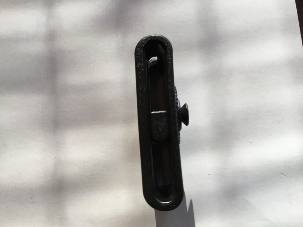 ITac paddle holster belt loop adapter.