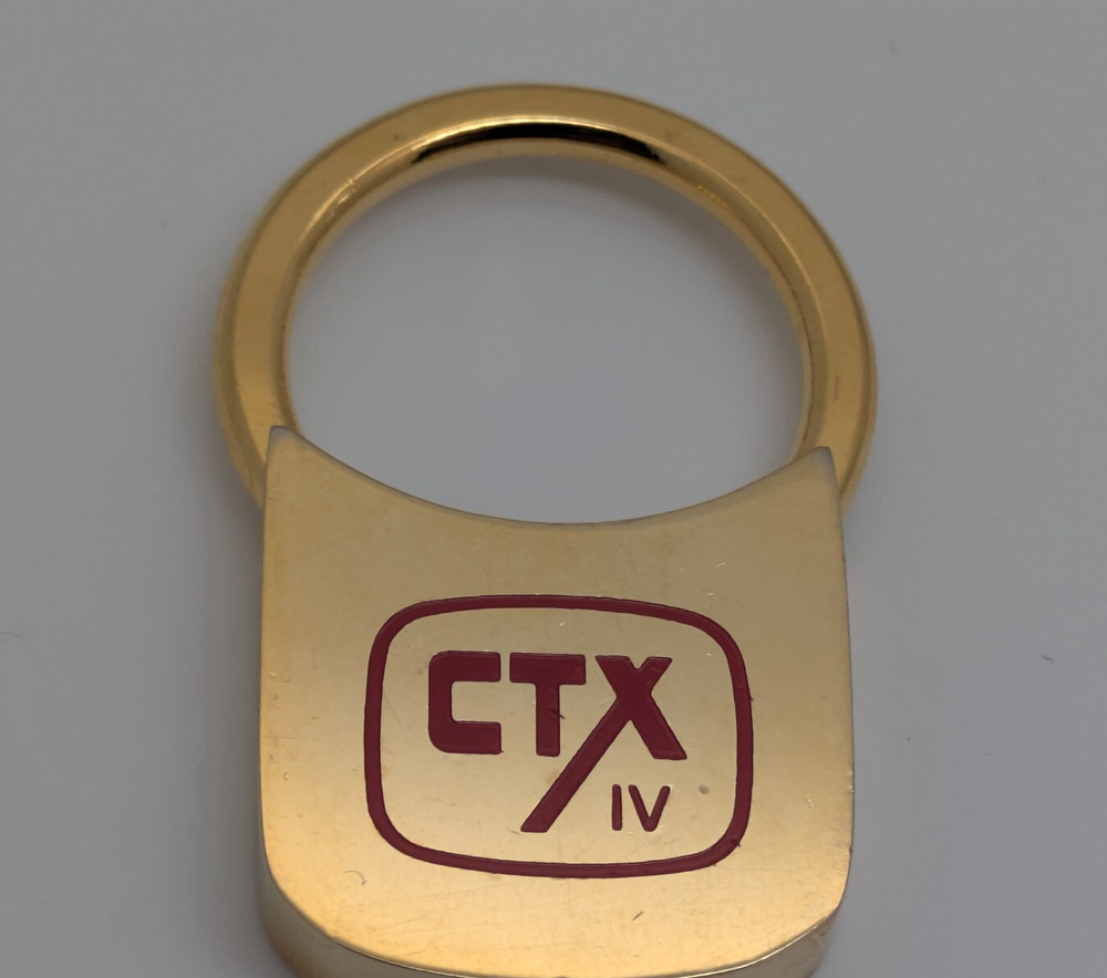 CTX IV Metallic Gold Toned Keyring