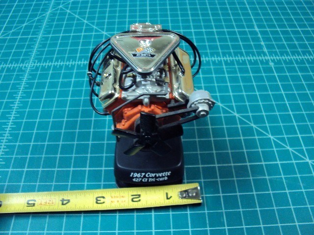 Miniature 427 ci Tri-carb engine.