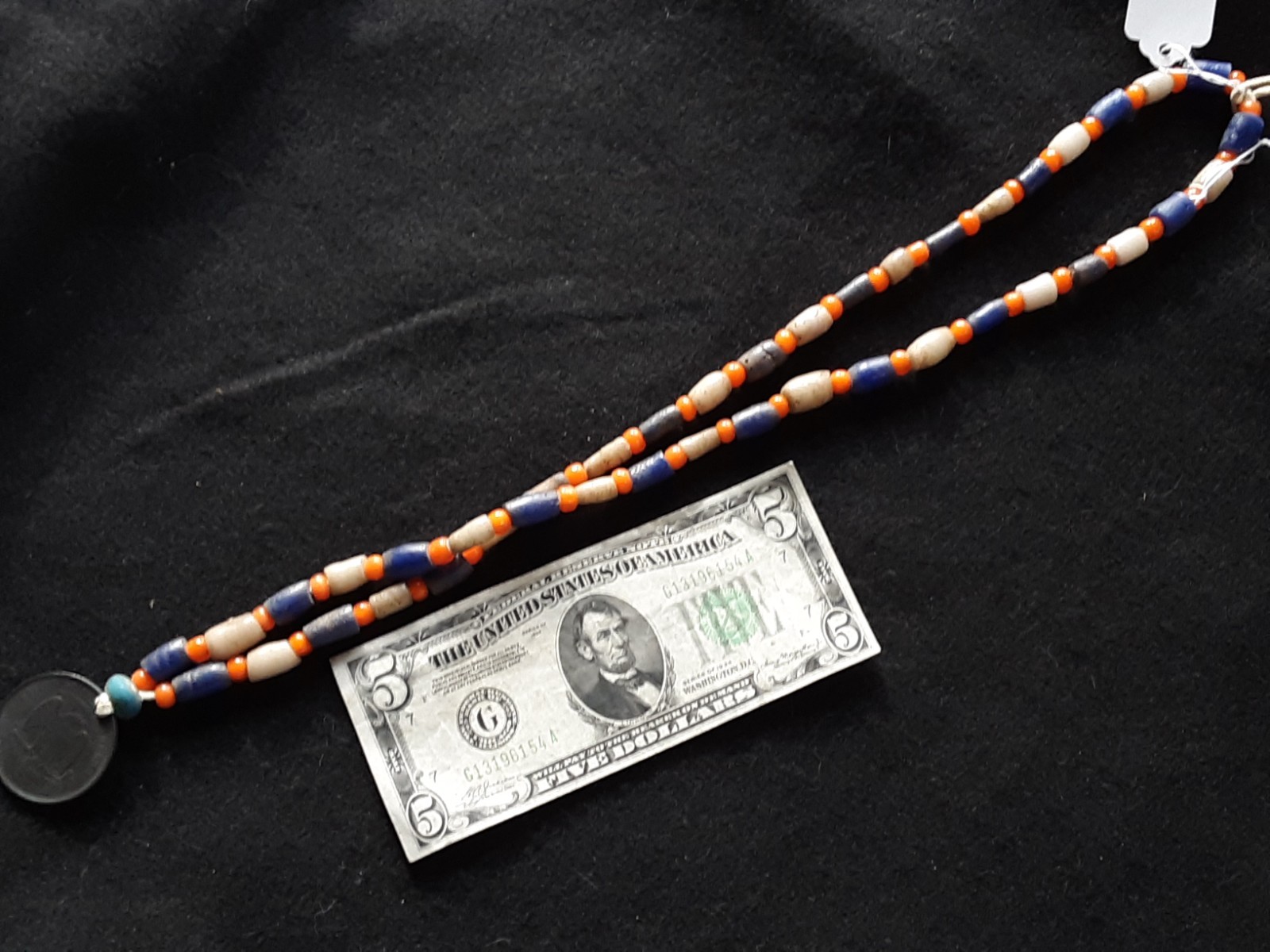 1878 TRADE DOLLAR COPY, ON LEATHER STRUNG TRADE NECKLACE, WHA-0226*09102