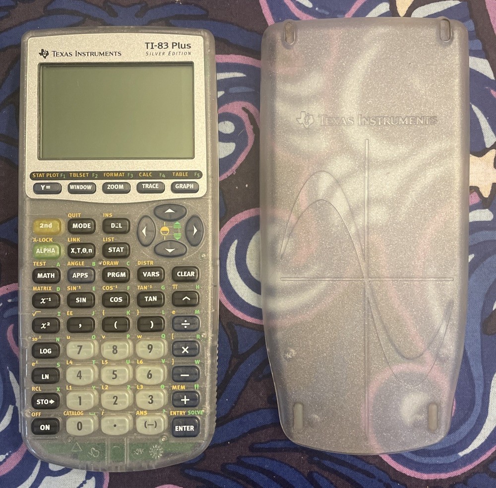 Texas Instruments TI-83 Plus Calculator CLEAR Silver Edition