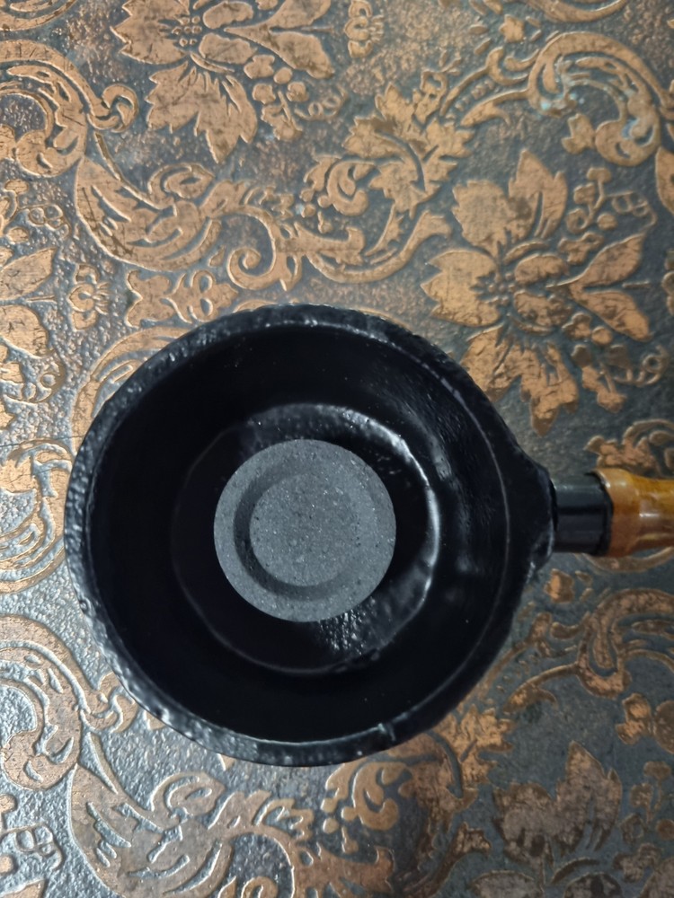Cauldron vessel with handle