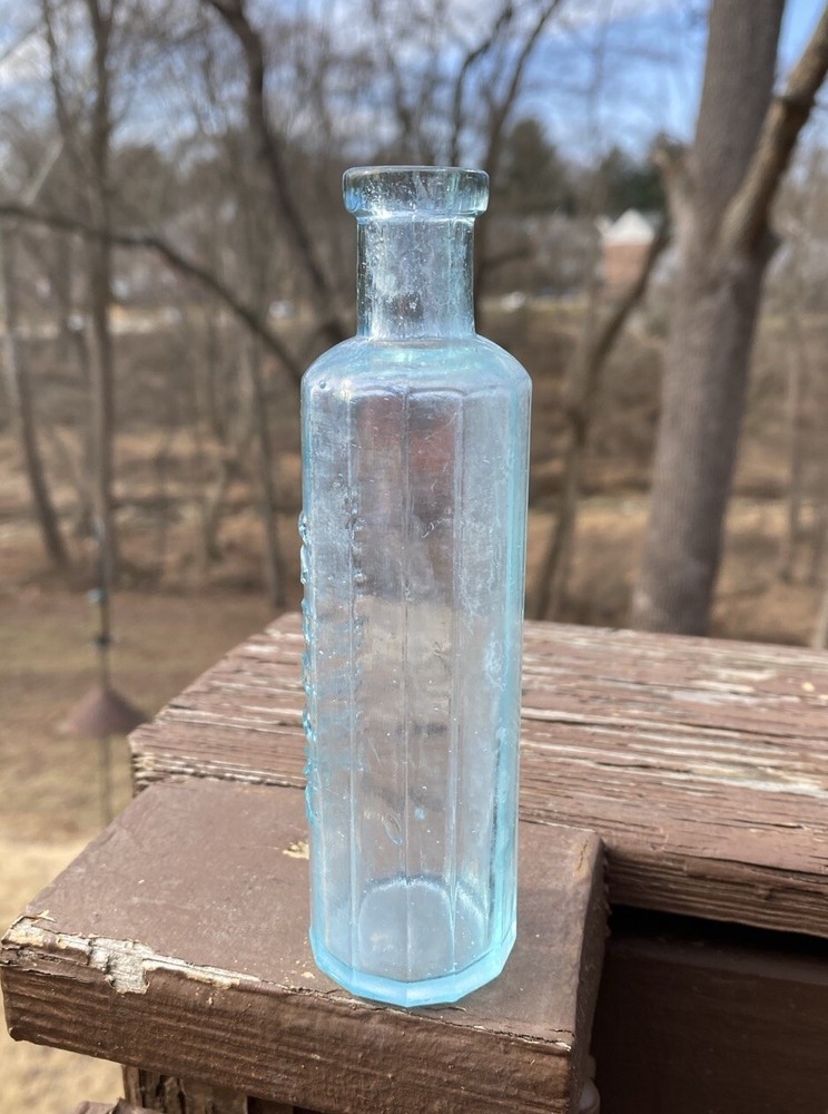 Carbona Products Co 12-sidesd Blown Bottle