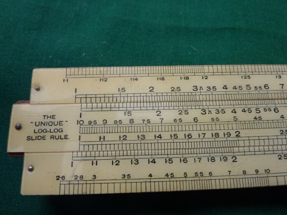 THE "UNIQUE" LOG-LOG SLIDE RULE