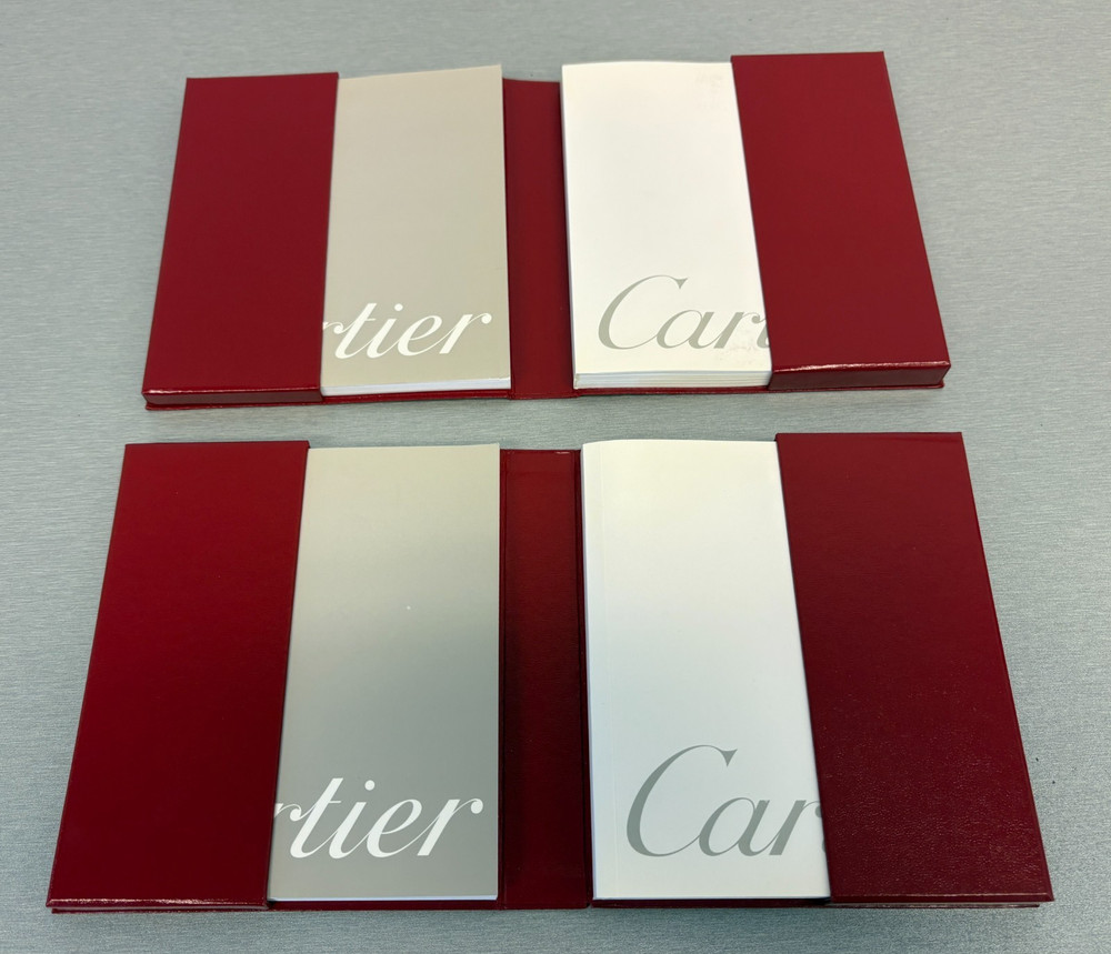 Two Cartier Original Certificate & Instruction Booklet's