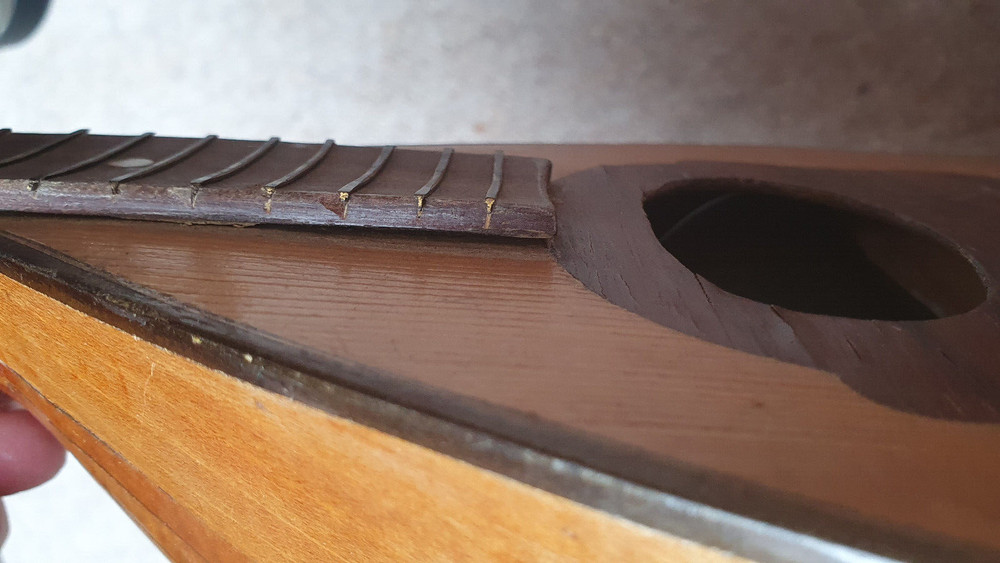 old mandolin, needs repair
