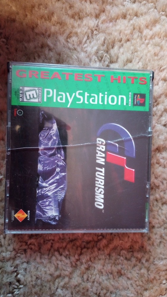 PlayStation 1 console with games