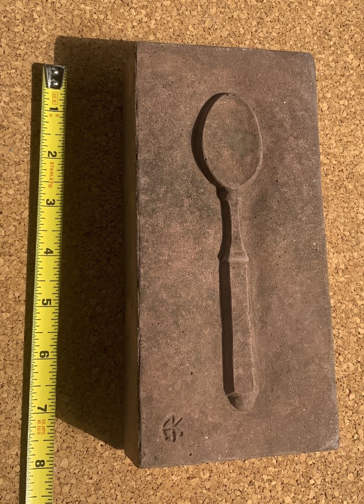 paving brick with spoon