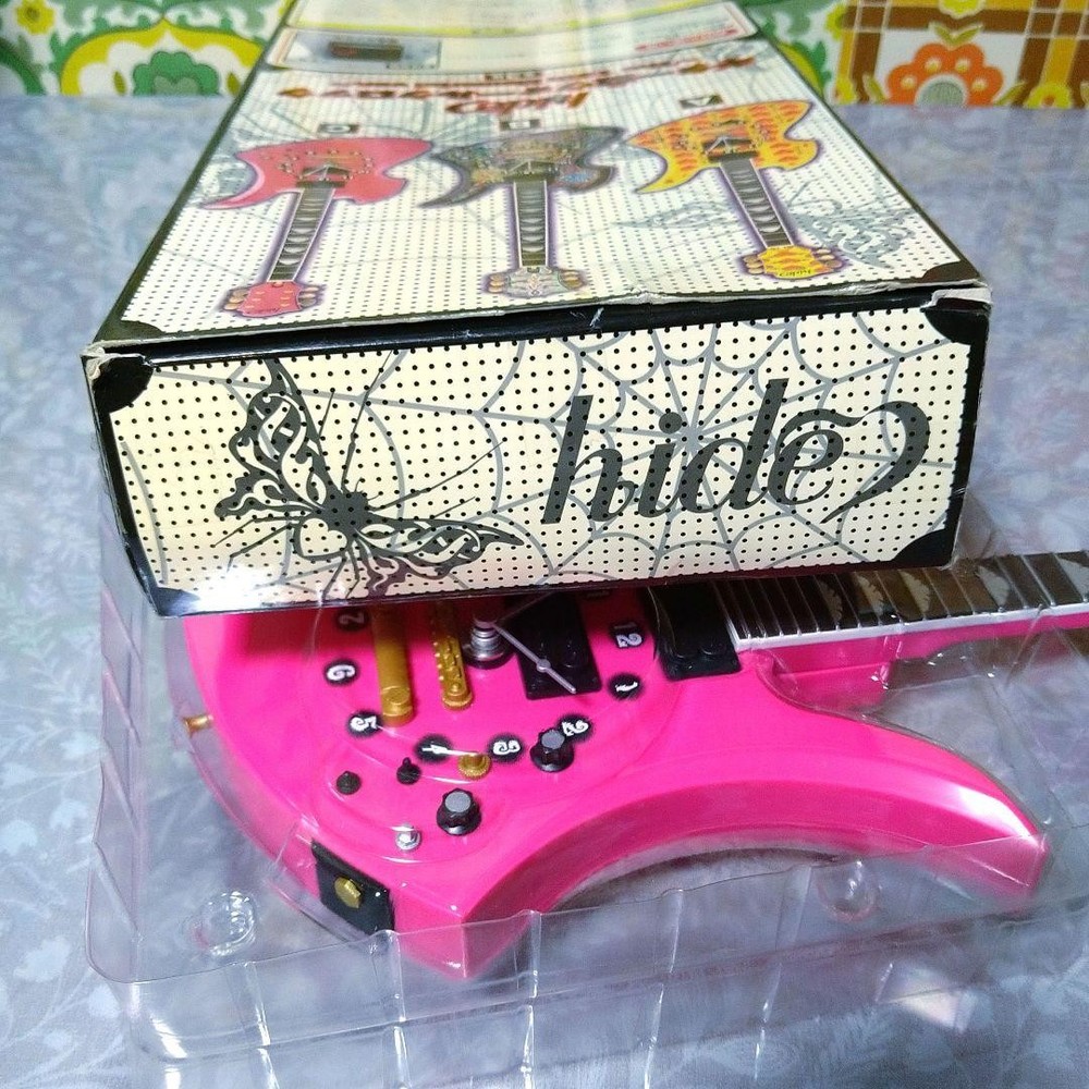 hide guitar wall clock pink