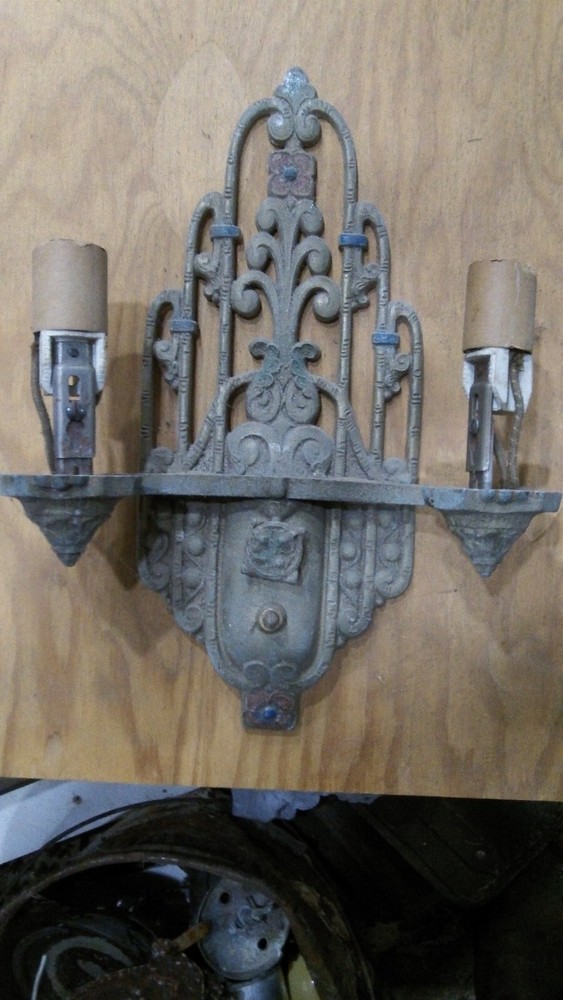 Vintage Lighting Seven sconces by Riddle!