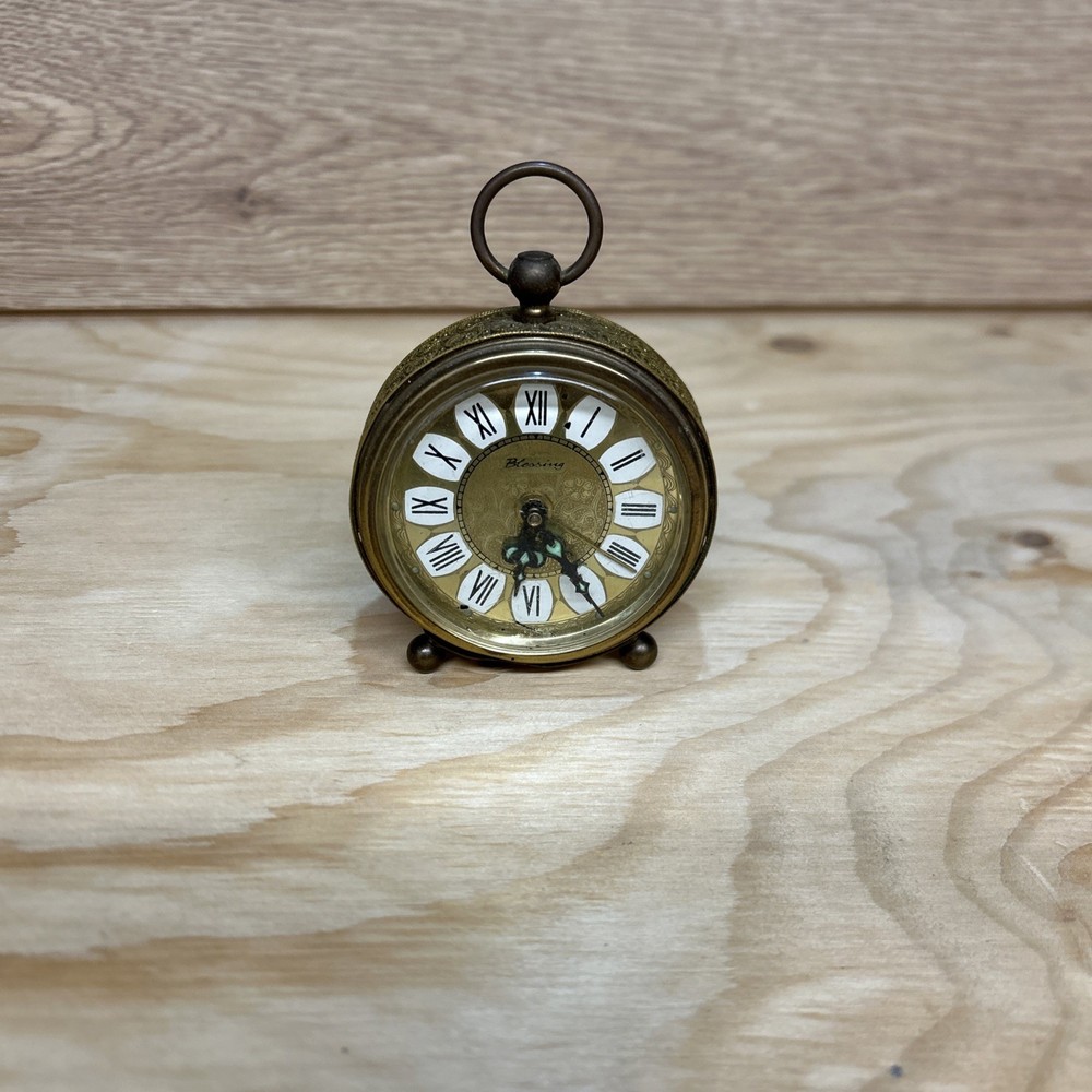 Blessing" German Gilt Metal Alarm Clock. Needs attention and one dial missing