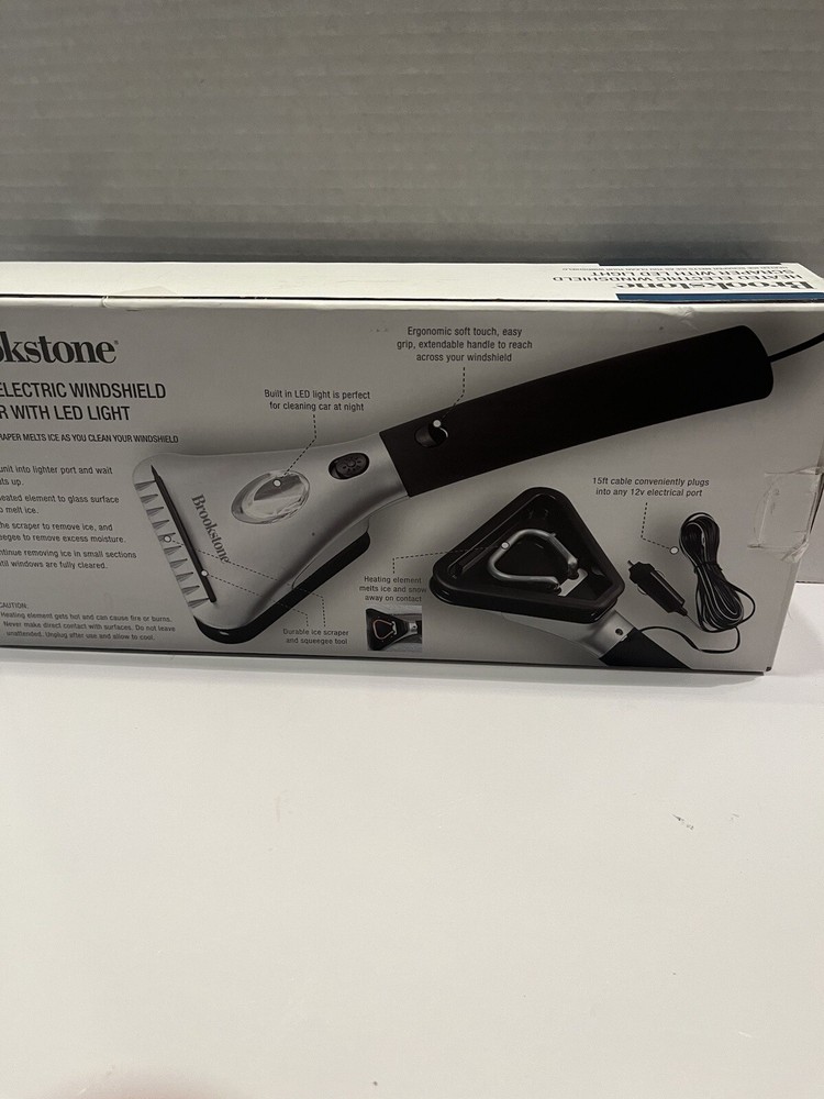 Brookstone heated electric windshield scraper with Led light Used