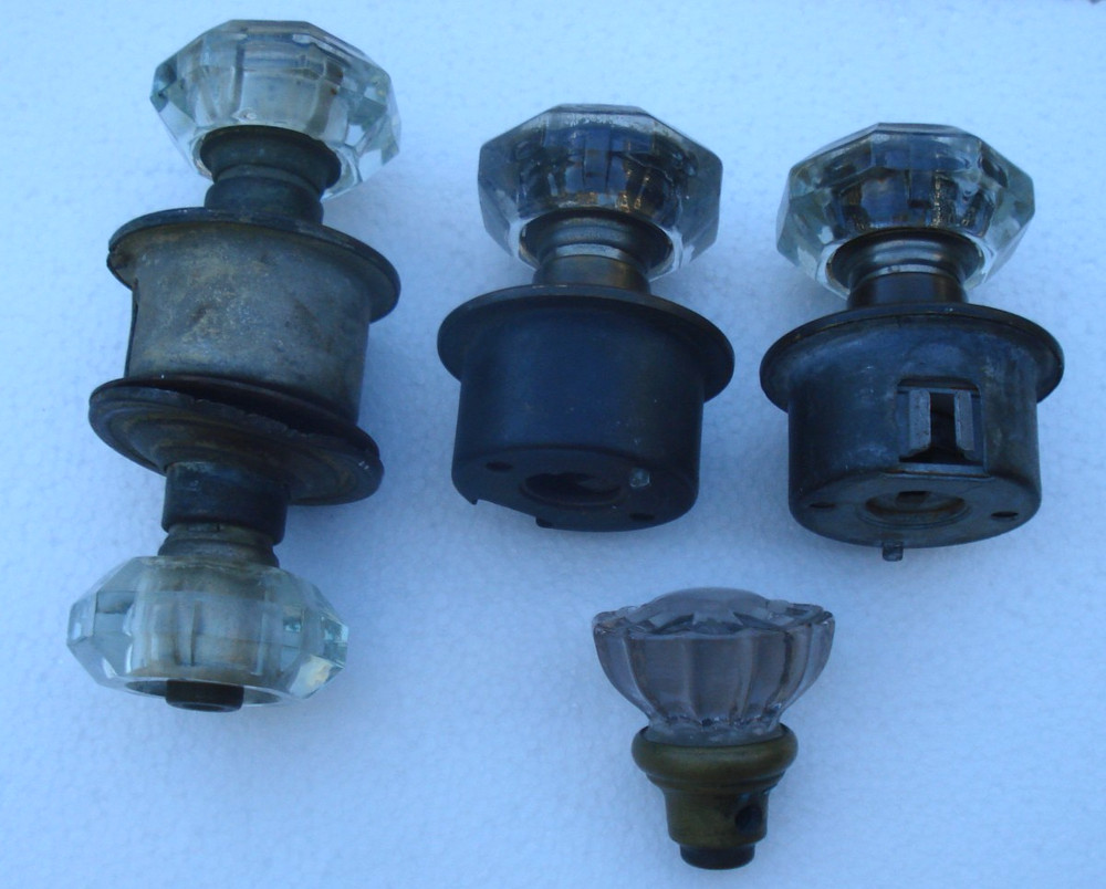 5 old vintage glass door handles/knobs....2 sets with metal attachments