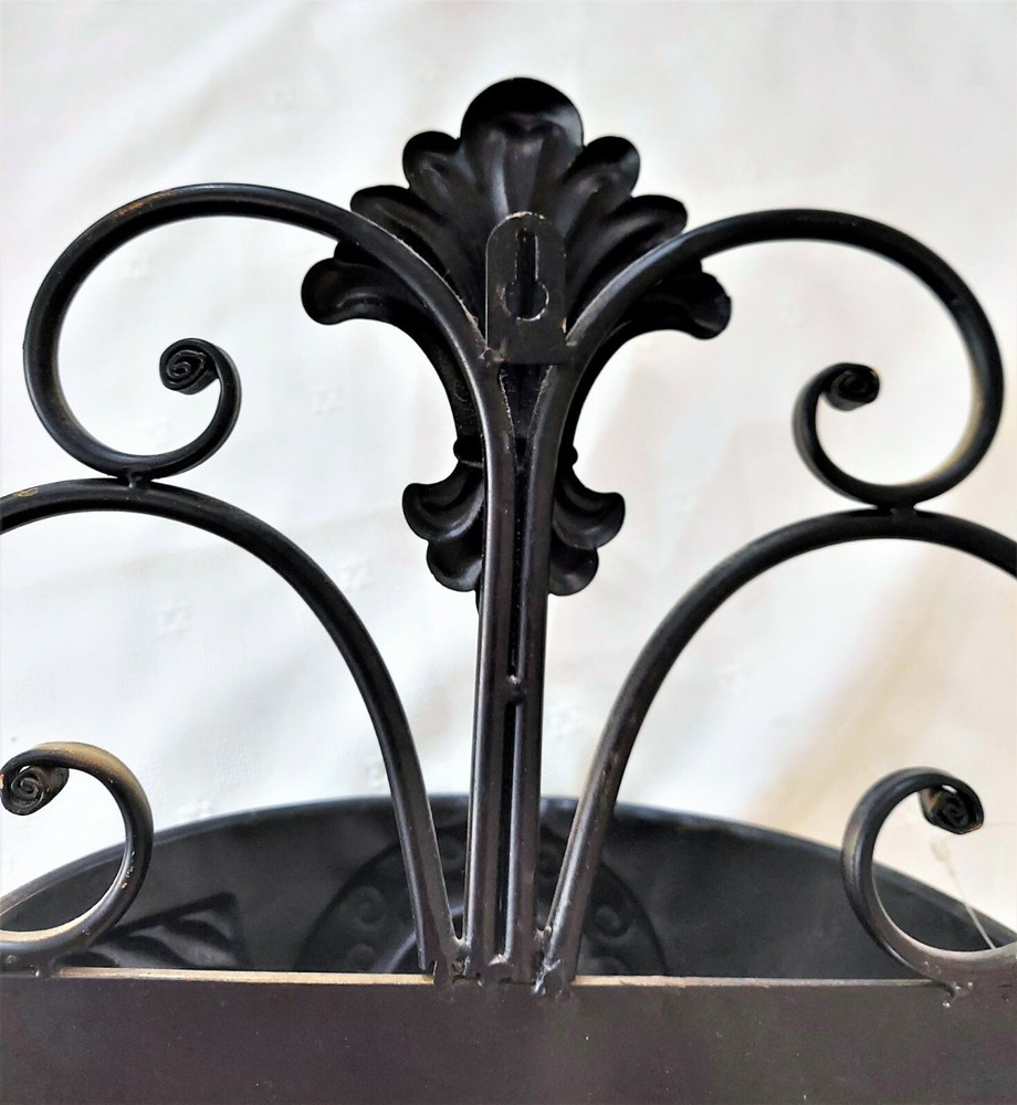 Large scroll work metal wall scone