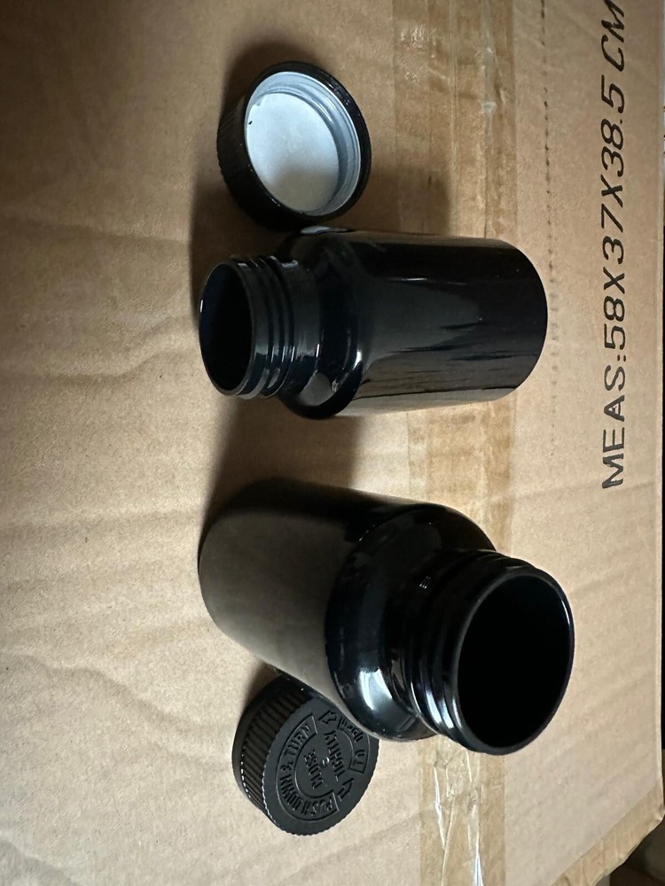 plastic Black bottles with CRC cap include pressure sensitive seal.336 unit