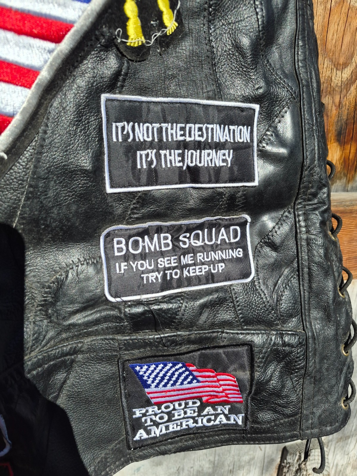 Vintage harley hog leather vest filled with pins and has patches 2xl