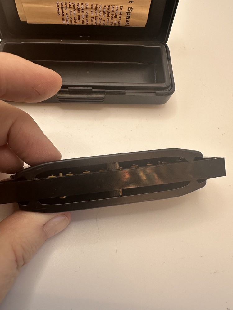 Vintage Old Black Hohner Pro Harp Harmonica D