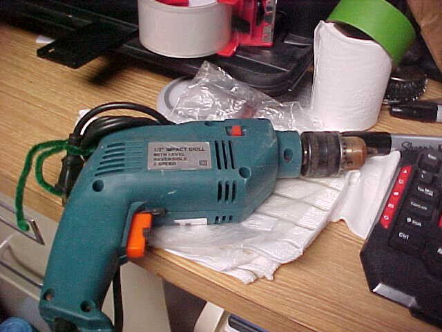 1/2 inch impact drill w/ level. reversible. 2 speed